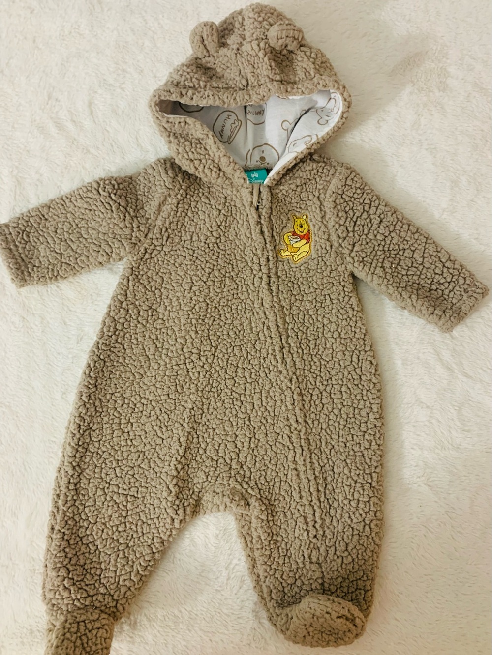 Disney Sherpa Footed One-Piece in Light Brown with Pooh Patch
